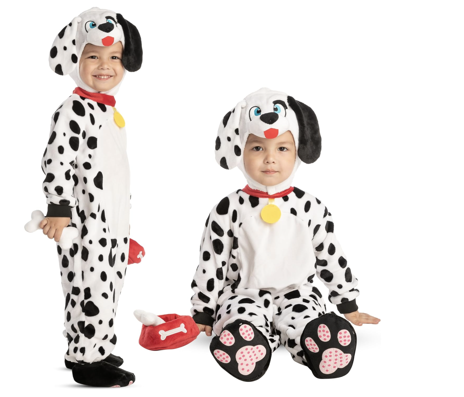 Toddler in a white jumpsuit with black Dalmatian spots, floppy ears, and a wagging tail.